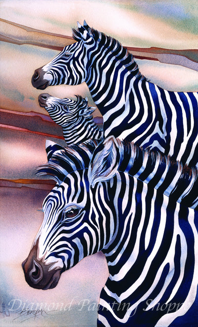 Watercolor-style diamond painting design of three zebras standing together in the savanna, featuring rich black-and-white stripes and a pastel sunset background.

